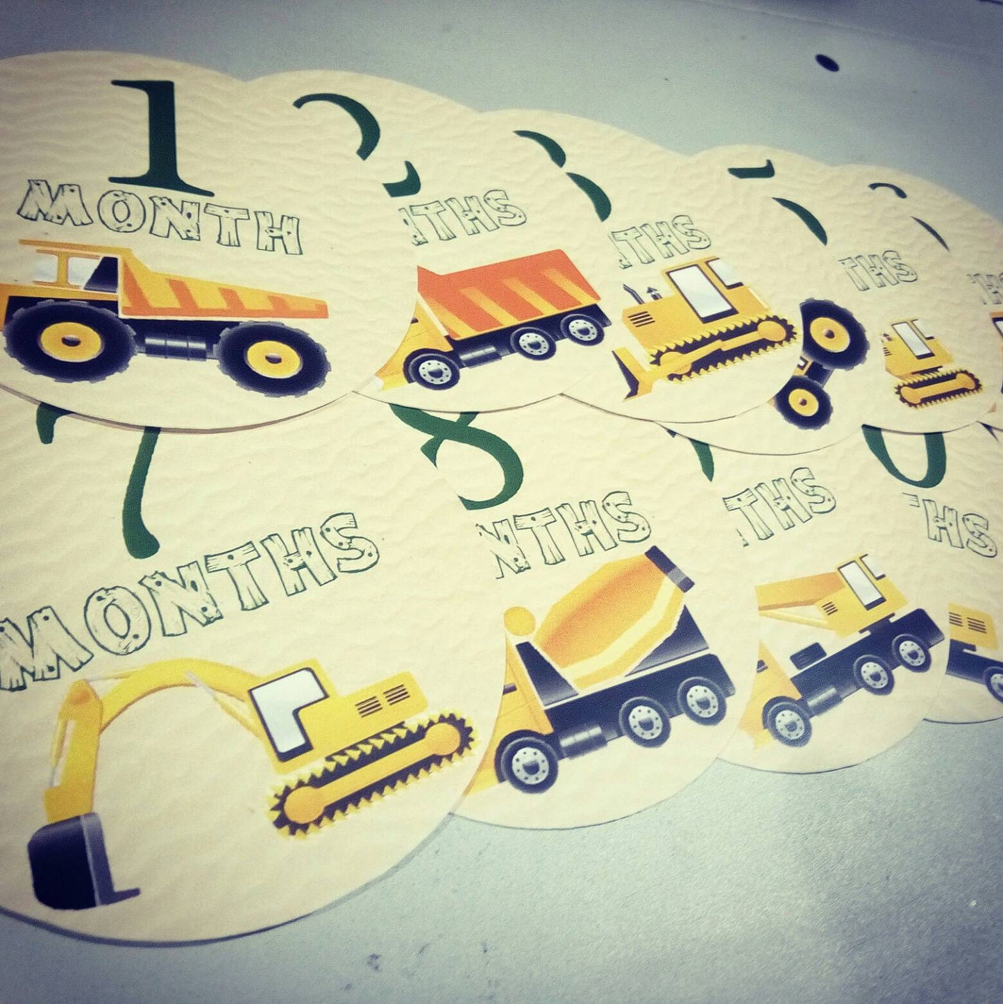 Monthly baby stickers. Work vehicles. Trucks, work, labor, construction, bulldozer, grader, crane