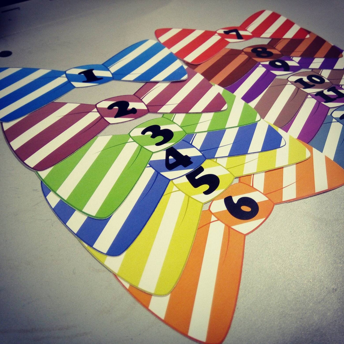 Monthly bowtie shaped baby stickers for onesie / romper / bodysuit