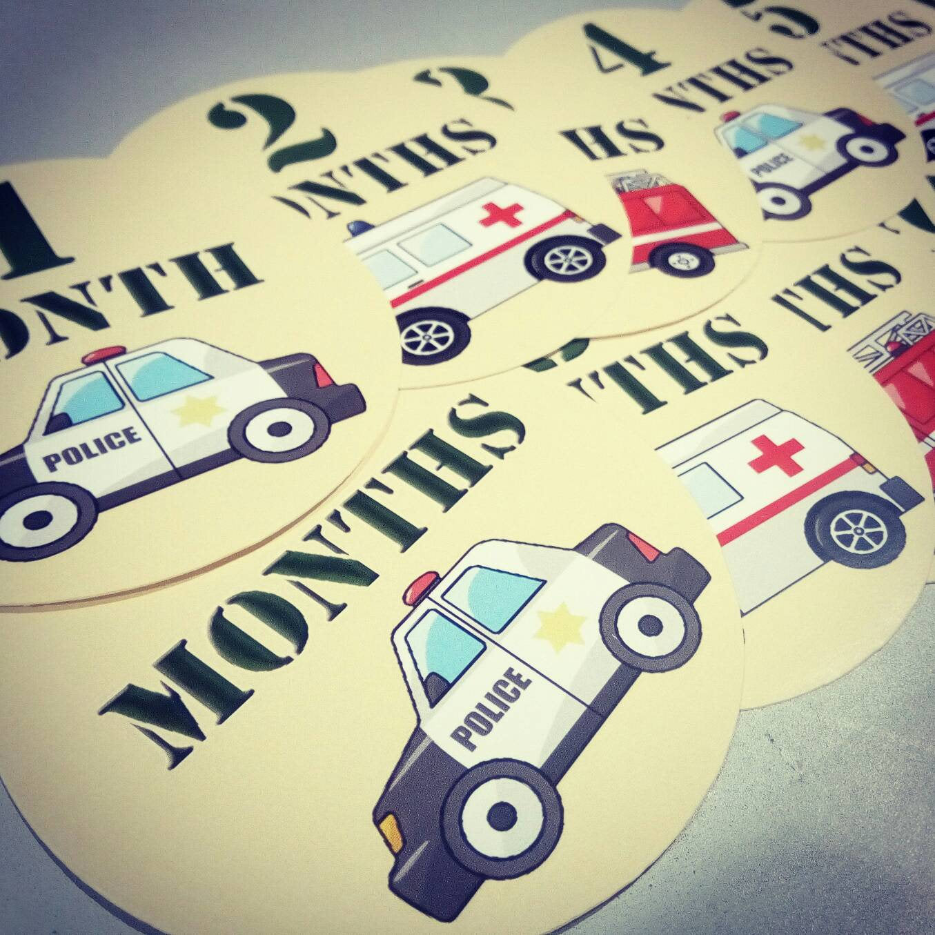 Emergency service vehicles Onesie month baby stickers. Ambulance, firetruck, emergency, police