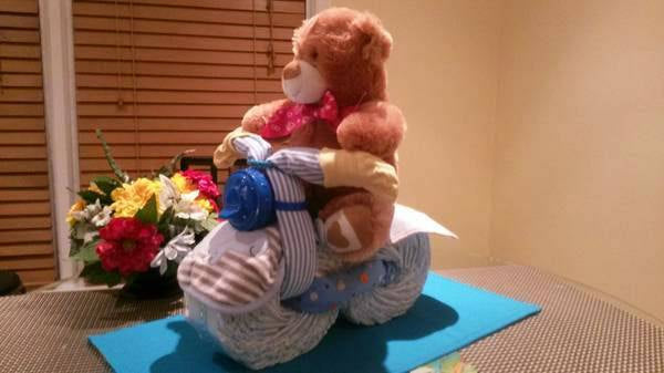 Bicycle Diaper Cake. Neutral baby shower centerpiece. Almost any plush toy as a biker