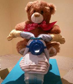 Bicycle Diaper Cake. Neutral baby shower centerpiece. Almost any plush toy as a biker